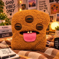 Thumbnail for Fuggler Bigg Nuggets three eyed plush on a plaid blanket with props