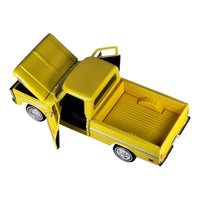 Thumbnail for Detailed view of the diecast metal chassis on the 1:64 scale Ford F-150 Dually.