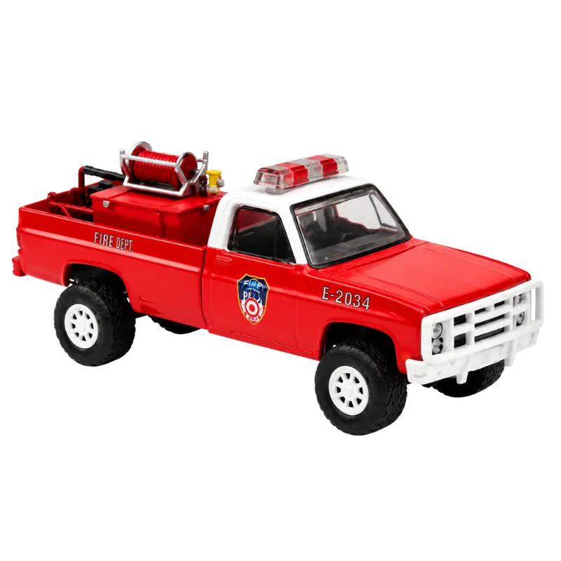 Greenlight FDNY 1986 Chevrolet M1008 red white fire department truck diecast 1:64 three quarter front