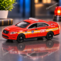 Thumbnail for Red FDNY 2016 Ford Police Interceptor Sedan 1:64 diecast with yellow and white stripes and roof light bar