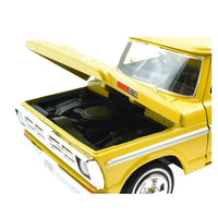 Thumbnail for Side view of the 1992 Ford F-150 Dually showing the extended rear fenders and chrome wheels.