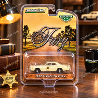 Thumbnail for Greenlight Exclusive 1977 Plymouth Fury Hazzard County Sheriff 1:64 diecast car in blister card with Fury script artwork