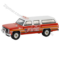 Thumbnail for Greenlight 1991 Chevrolet Suburban FDNY Battalion Chief diecast car front three quarter view with push bar and number 35