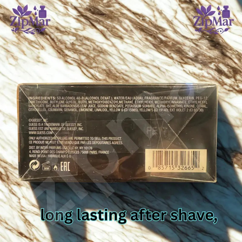 Guess Uomo After Shave box side with ingredients, UPC barcode, Inter Parfums USA distributor and Made in USA