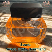Thumbnail for Honey and Peaches Eau de Parfum amber glass bottle with black rectangular cap on a marble surface