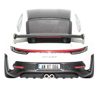 Thumbnail for Rear view of Hot Wheels Gran Turismo Porsche 911 GT3 RS diecast showing wing and exhaust