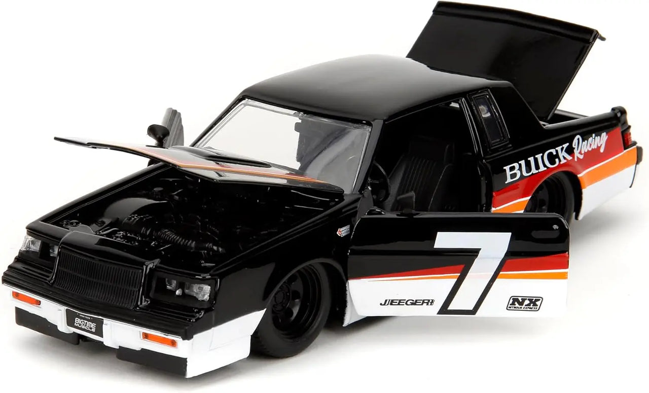 High angle view of the 1:24 scale 1987 Buick Grand National diecast car with the hood, doors, and trunk all open to reveal details.