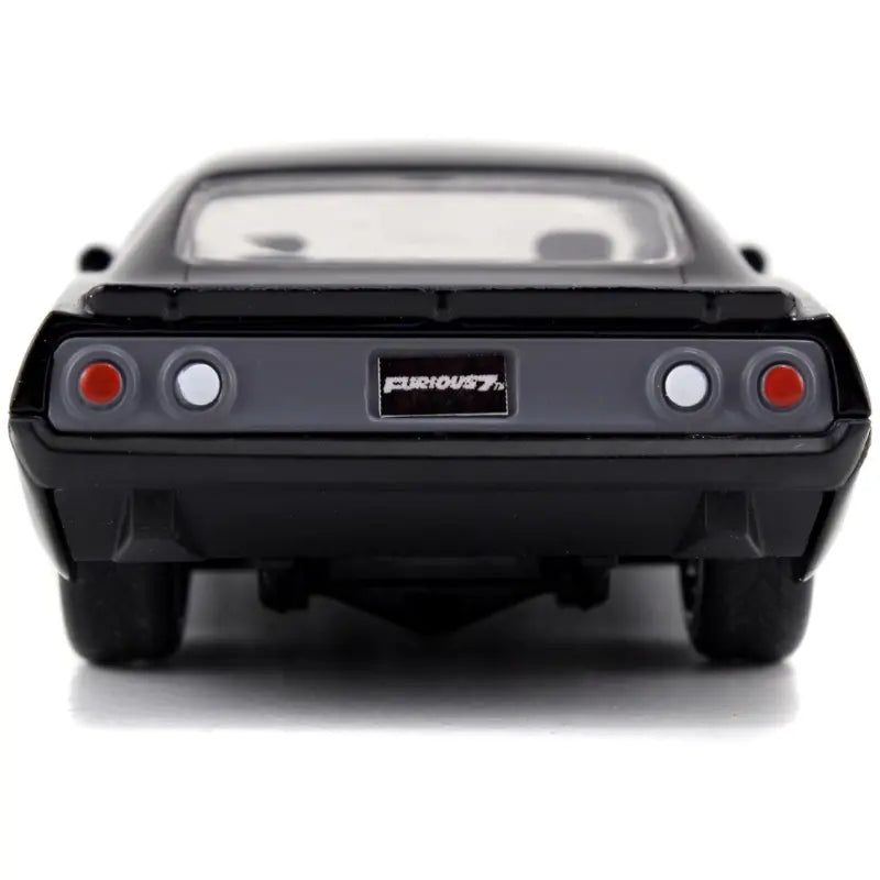 Rear view of the Jada 1:24 diecast model of Letty's Plymouth Barracuda showing tail lights and Fast & Furious license plate.