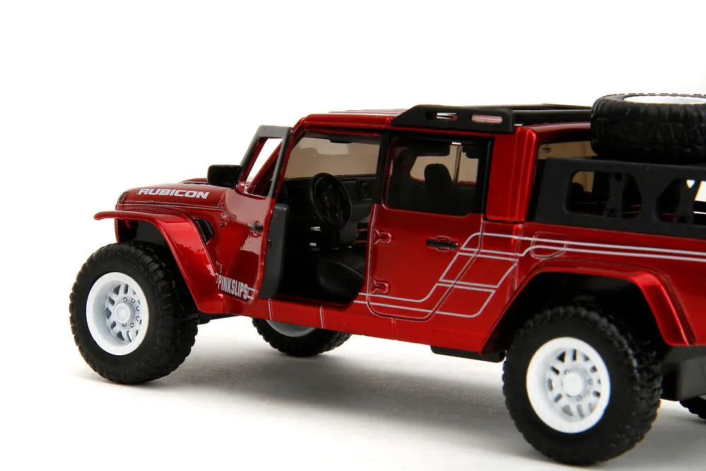 Close up of the opening door and interior detail of the 1:32 scale metallic red Jeep Gladiator diecast.