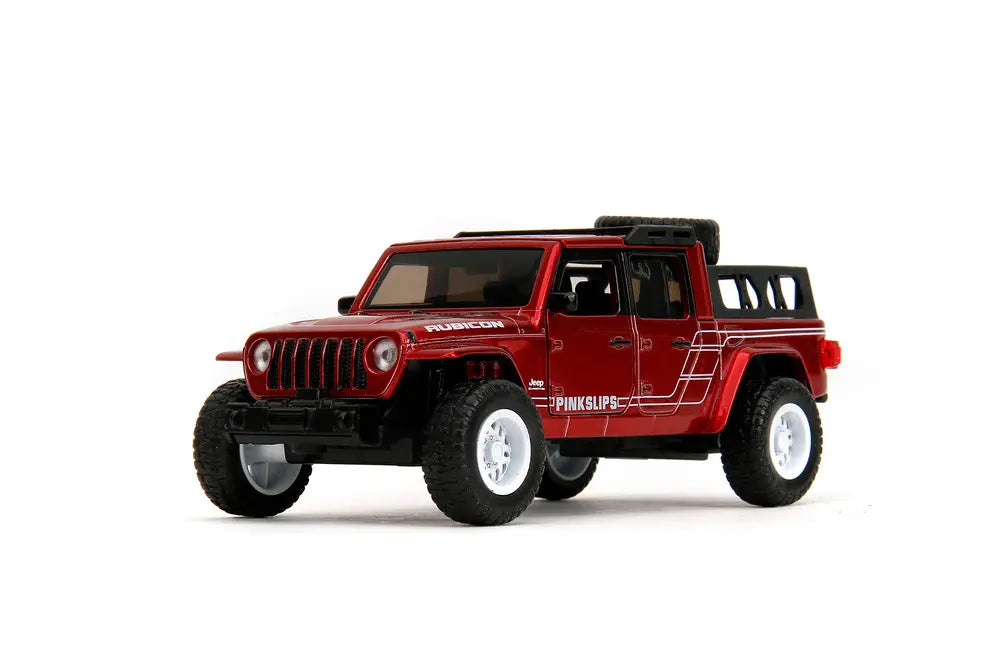 Side profile of the Jada Pink Slips Jeep Gladiator showing the white custom graphics and Rubicon decals.