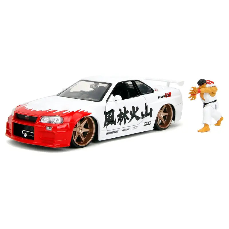 Street Fighter Ryu diecast figure posing next to 2002 Nissan Skyline GT-R R34 model