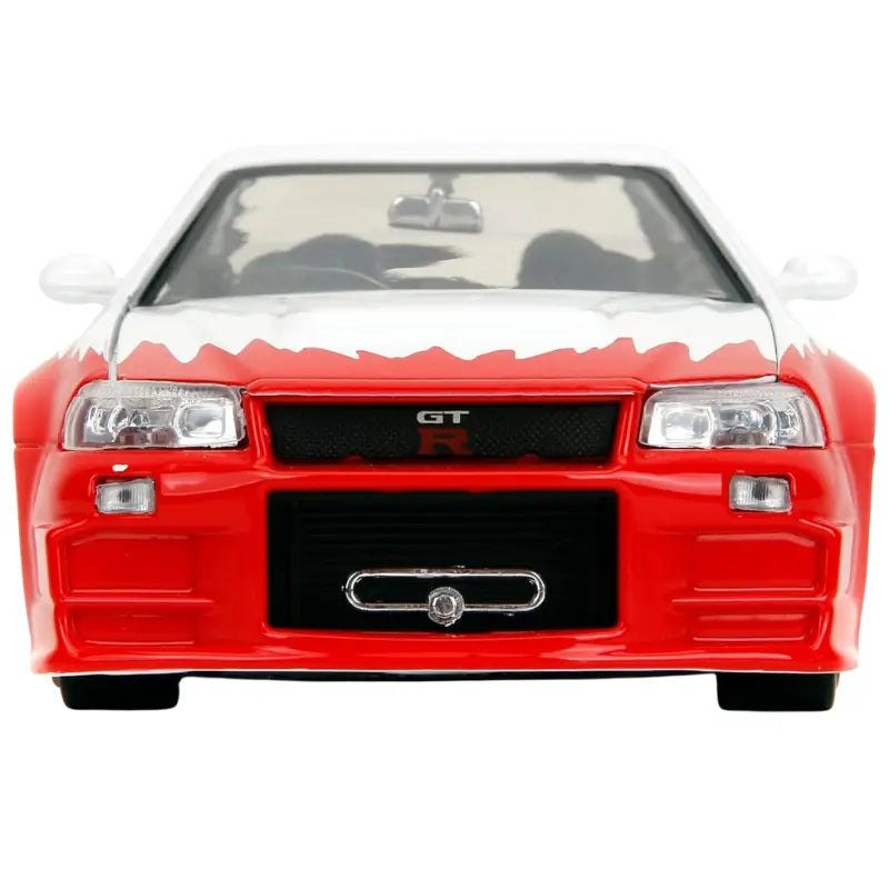 Close up of front grille and GT-R badge on Street Fighter Ryu edition Nissan Skyline