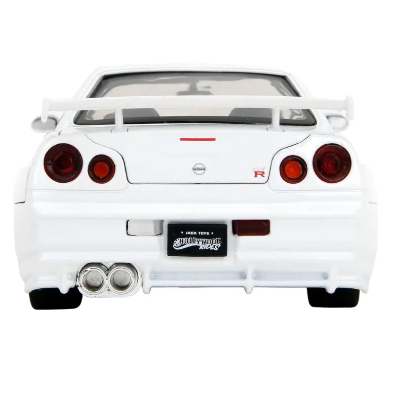Rear view of Nissan Skyline GT-R R34 diecast car with Hollywood Rides license plate