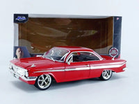 Thumbnail for The Jada Toys Fast & Furious F8 1961 Chevy Impala 1:24 die-cast model safely secured within its original window box packaging.