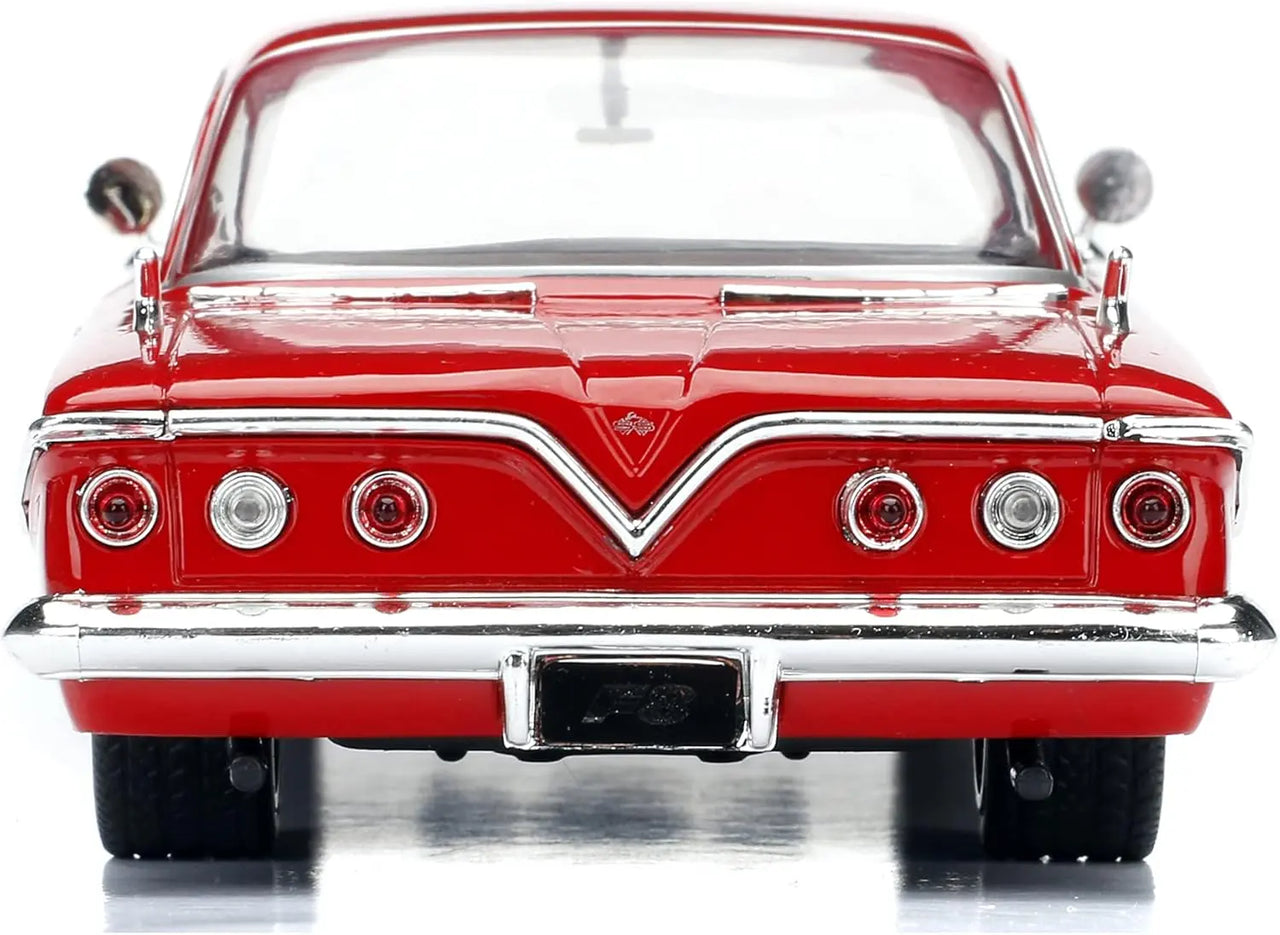 Direct rear view of the Jada Toys Fast & Furious F8 1961 Chevy Impala die-cast model car showing taillights.