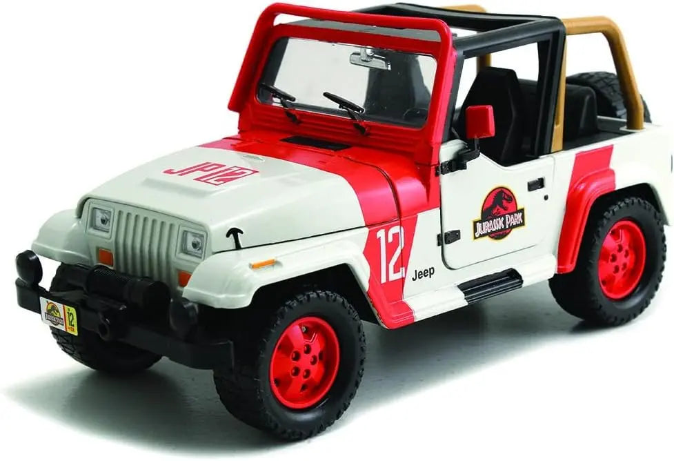 Jada Toys 1:24 scale Jurassic World diecast Jeep Wrangler JP12 in original window box packaging showing front winch and T-Rex graphics.