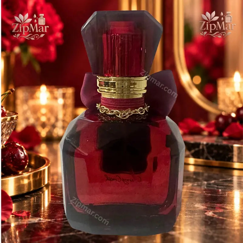 Side view showing dark red glass bottle and faceted cap of Jean Marc Paris Cherry Crush
