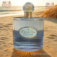 Thumbnail for Front view of Jean Marc Paris L'air de Paris Cote d'Azur bottle set against a warm sunlit sand beach