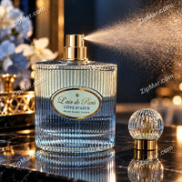 Thumbnail for Jean Marc Paris L’air de Paris Côte d’Azur ribbed glass perfume bottle with oval label, spraying beside a ribbed glass cap