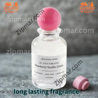 Thumbnail for Jean Marc Paris de Gourmand Strawberry Vanilla Cream eau de parfum bottle with pink ball cap on a gray stone surface