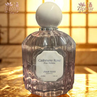 Thumbnail for Jean Rish Cashmere Rose Pour Femme Eau de Parfum 100 mL pink fluted bottle with cream label and silver collar