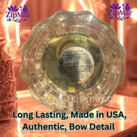 Thumbnail for Fluted glass bottle of Jean Rish Rose Nectar Eau de Parfum against floral backdrop