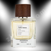 Thumbnail for Perfume bottle labeled 'SCENT Amber Intense' by Jean Irish on a gray background