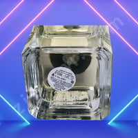 Thumbnail for Clear glass bottle with a label on a blue and pink gradient background