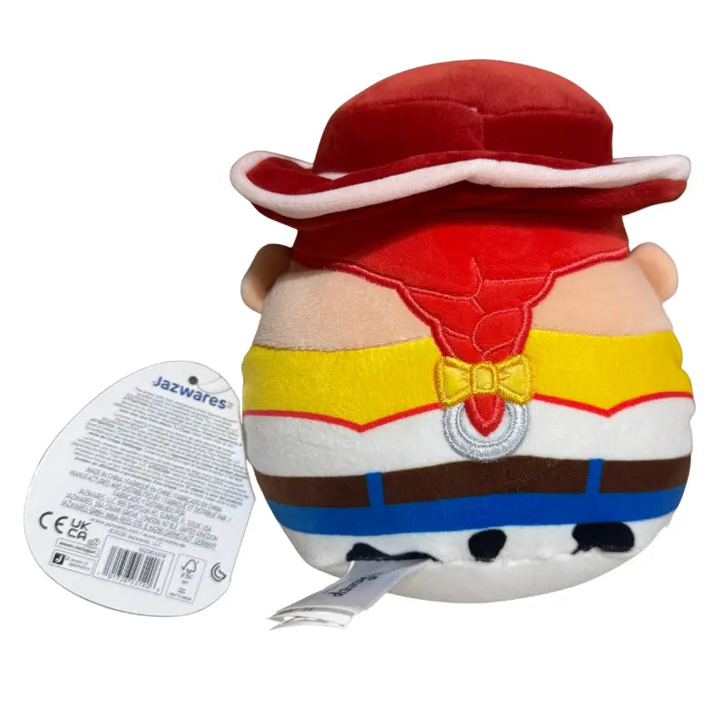 Back view of Jessie Squishmallows showing red braided hair and hat detail.