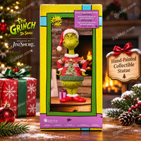 Thumbnail for Jim Shore Grinch in Ugly Sweater Statue box side panel showing the Grinch in a Santa hat and red ugly sweater