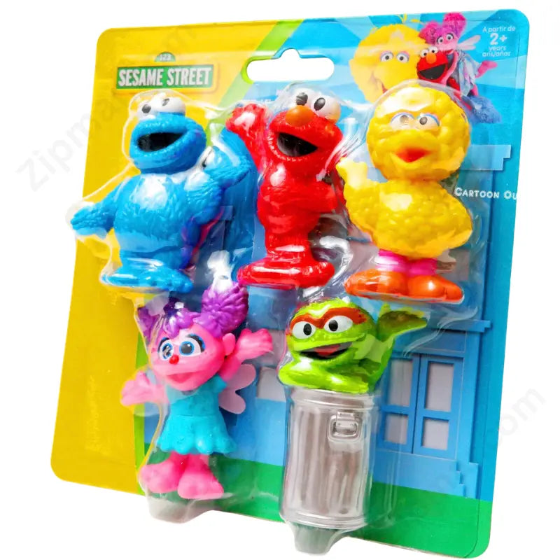 Just Play Sesame Street Mini Figures 5-Pack retail blister card showing Cookie Monster, Elmo, Big Bird, Abby Cadabby, and Oscar the Grouch in color