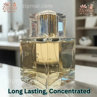 Thumbnail for Close-up of Karen Low Pure d'Or Eau de Parfum bottle releasing mist from gold atomizer