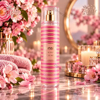 Thumbnail for kensie Floral Crush Body Mist 8 fl oz spray bottle with pink flowers and candle on blush marble vanity