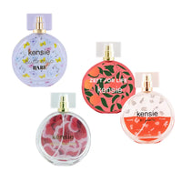 Thumbnail for Kensie Fragrance Collection four round mini perfume bottles styled product shot all four variants