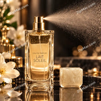 Thumbnail for Lait Soleil eau de parfum 3.4 fl oz 100 ml glass bottle with gold atomizer spraying beside a pearl white cap