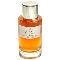 Thumbnail for Straight-on front view of the complete Le Monde Gourmand Chai Éclair Hair and Body Mist 3.4 oz bottle with silver cap.
