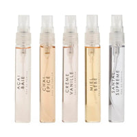 Thumbnail for Le Monde Gourmand Crème de la Crème five purse spray EDP vials flat lay Açaï Baie Chai Épicé Crème Vanille Miel Bébé Santal Supreme