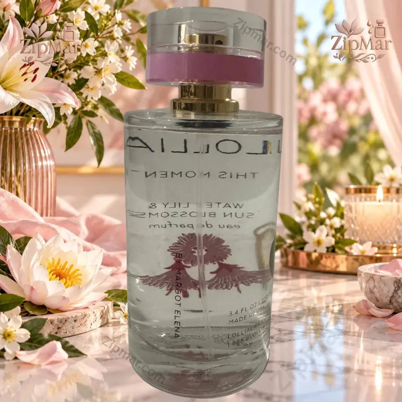 Lollia This Moment No. 43 Eau de Parfum Water Lily Sun Blossoms 3.4 oz close-up with lily flowers