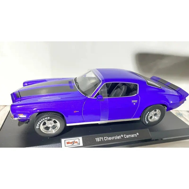 Maisto 1971 Chevrolet Camaro purple diecast 1:18 on display stand side view
