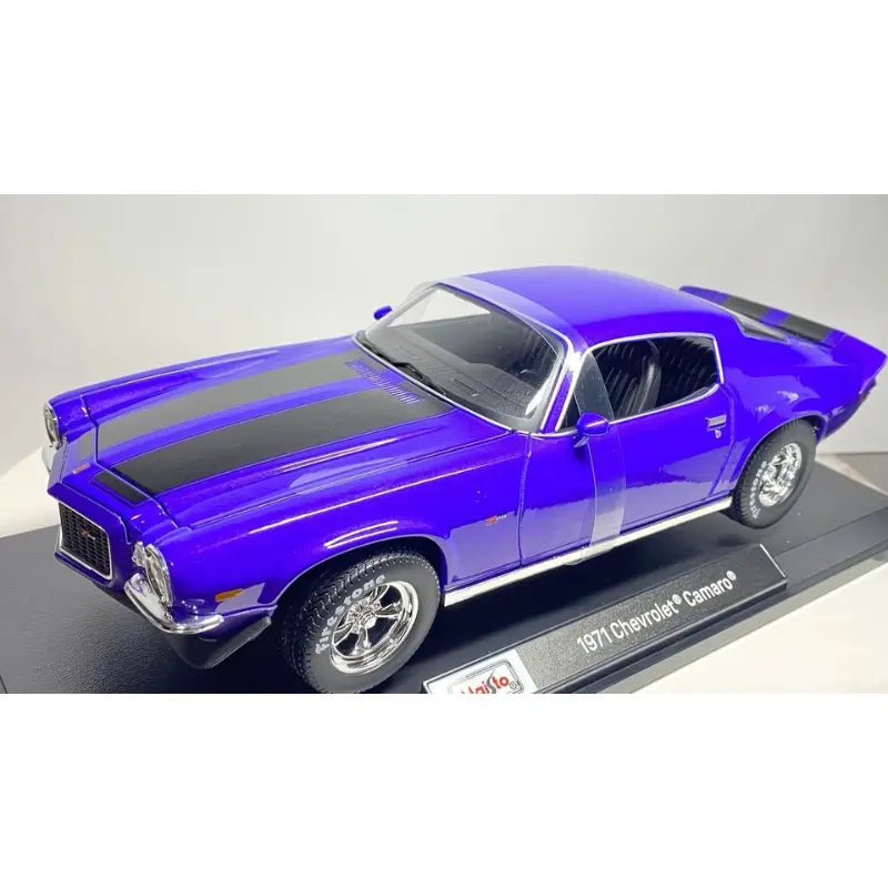 Maisto 1971 Chevrolet Camaro purple diecast 1:18 three quarter front display stand