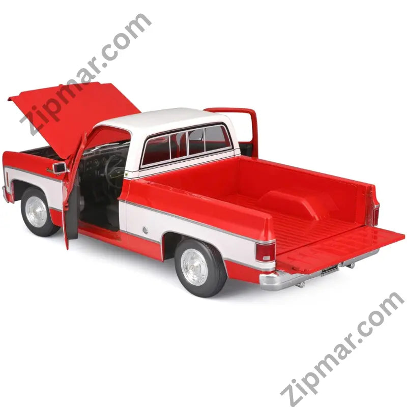 Maisto 1:18 1974 Chevrolet C10 Cheyenne Super diecast model rear view with open hood, door, and tailgate”