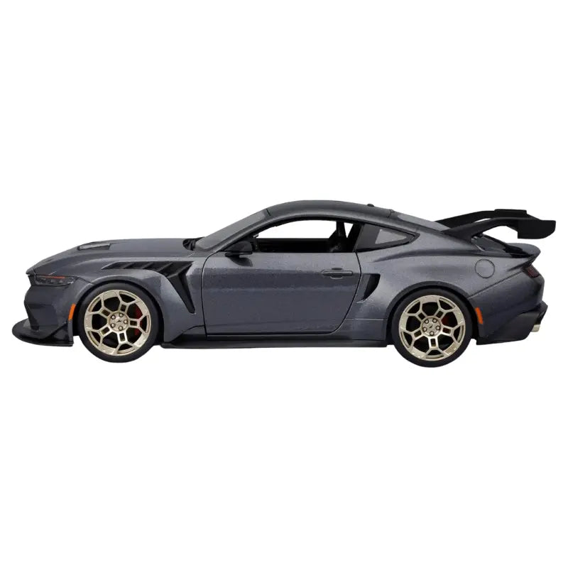 Maisto 2025 Ford Mustang GTD gray diecast 1:18 driver side profile gold wheels spoiler