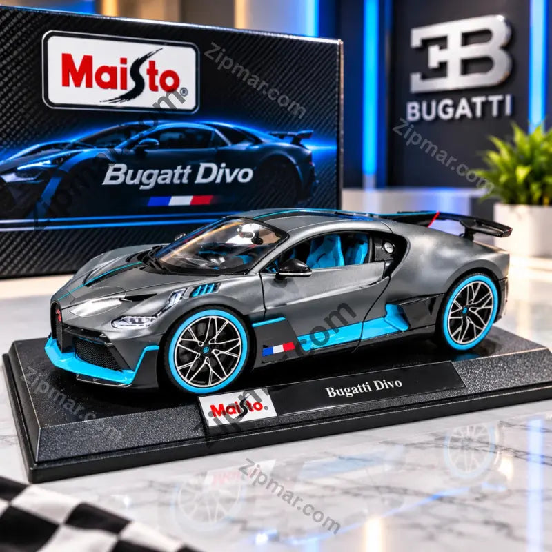 Maisto Bugatti Divo diecast model car in matte gray with light blue accents and blue wheel rims on a black display base, in front of its collector box