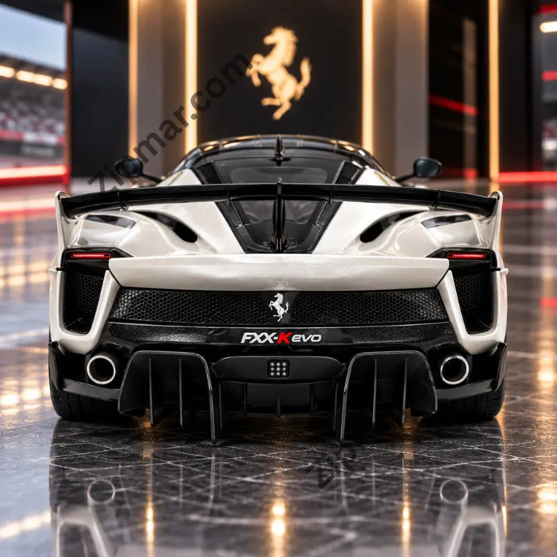 Rear view of white Maisto Ferrari FXX K Evo 1:18 diecast with black wing and exhausts