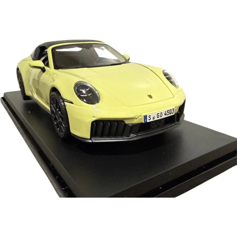 Maisto Porsche 911 Targa 4 GTS yellow diecast 1:18 front view on display stand