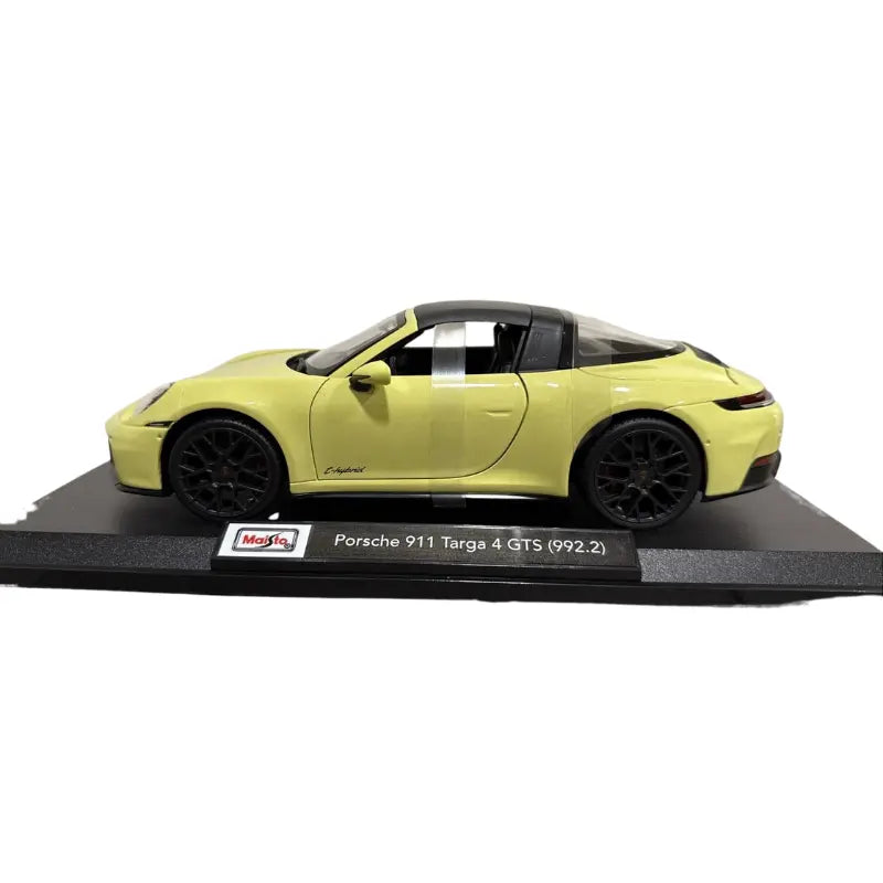 Maisto Porsche 911 Targa 4 GTS yellow diecast 1:18 side profile on display stand