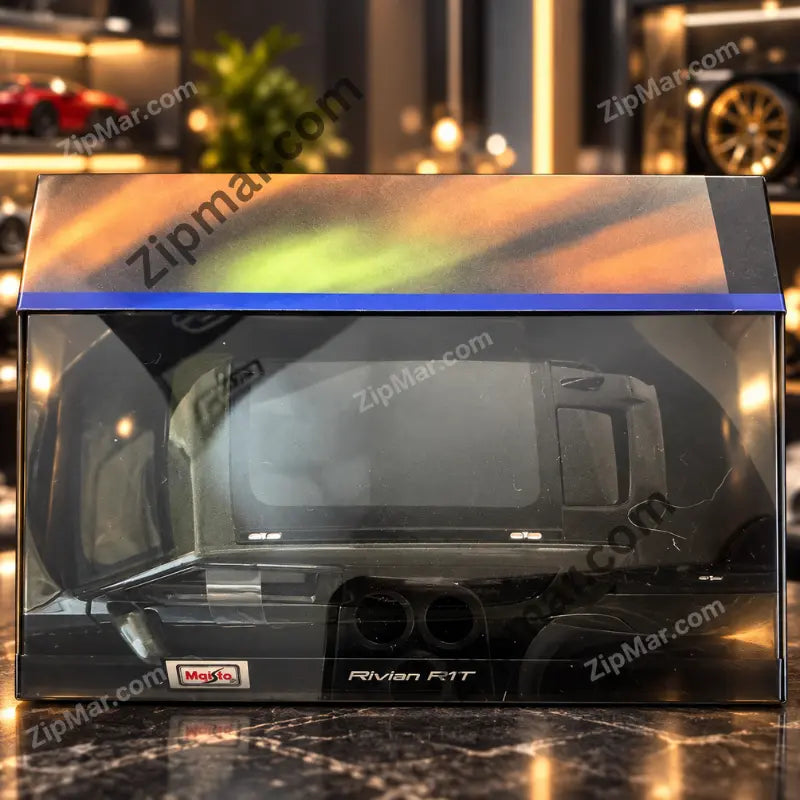 Top view through the window of Maisto Rivian R1T Special Edition box with model nameplate