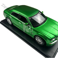 Thumbnail for Maisto 2005 Chrysler HEMI 300C 1:18 green diecast model on its black display base, front three quarter view
