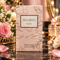 Thumbnail for Mark and James by Badgley Mischka Audrey eau de parfum 100 ml box front with gold floral pattern”