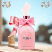 Thumbnail for Melina for Women Eau de Parfum 2.7 fl oz pink bottle with pink bow and frosted cap in sunlight